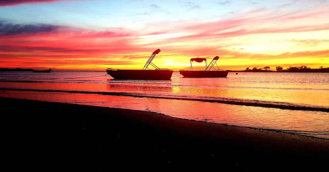 Sunset in Monkey Mia with boats