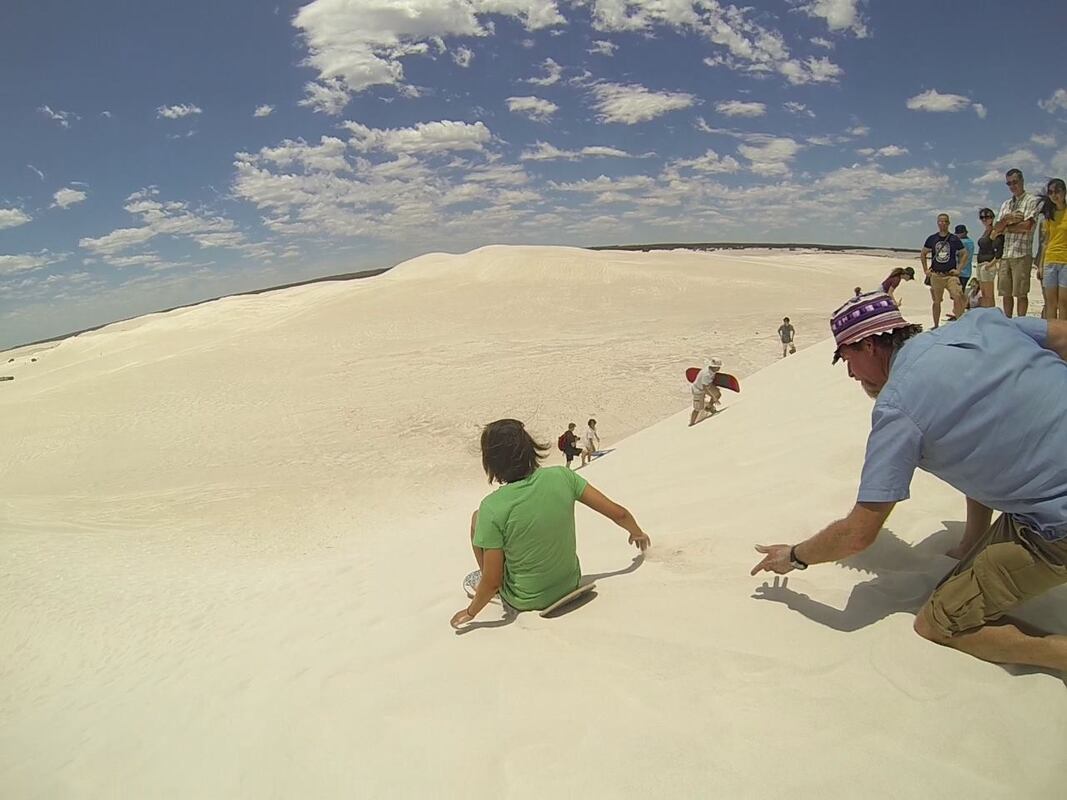 Ready, Set, Send! Sandboarding launching down the dune