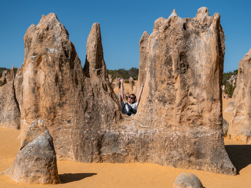 Travellers exploring the Pinnacles Desert on a Perth to Exmouth tour